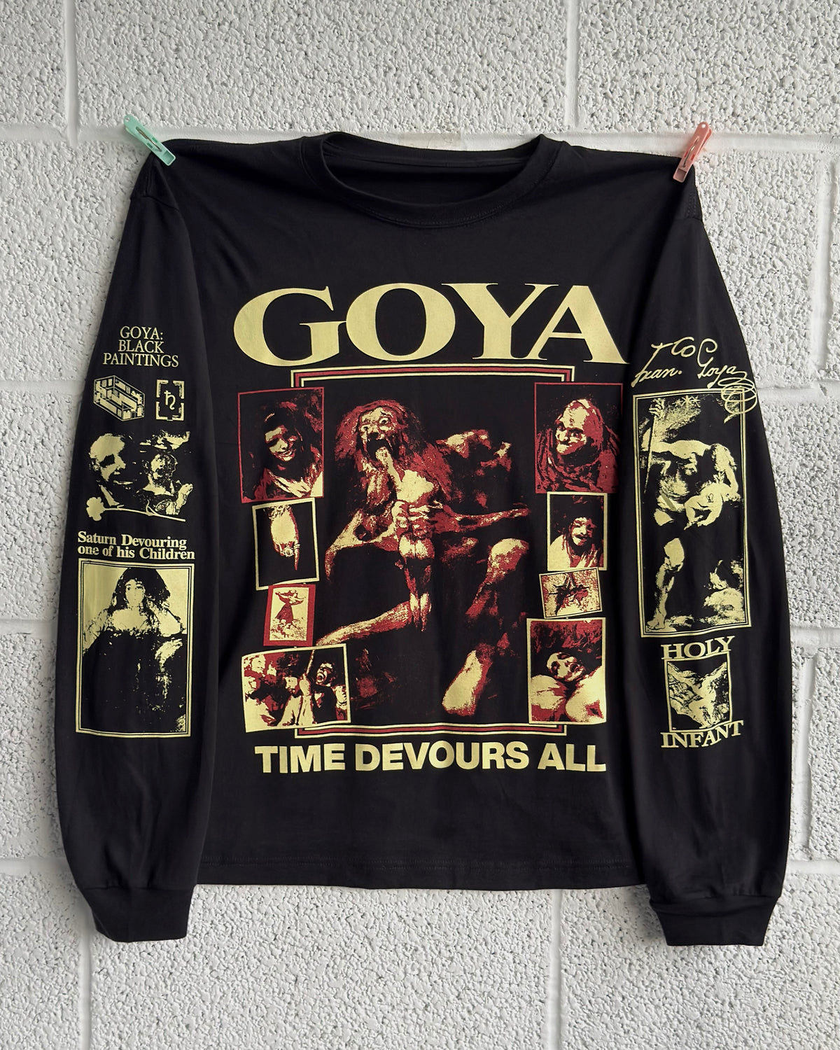 GOYA Longsleeve - Black, hung on wall