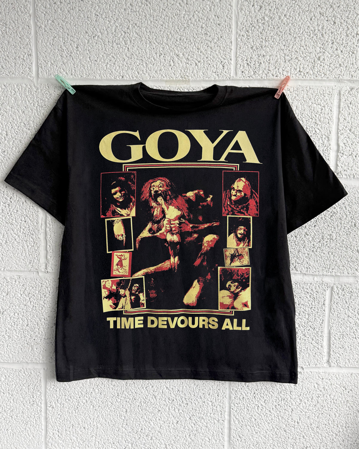 GOYA T-Shirt - Black, hung on wall